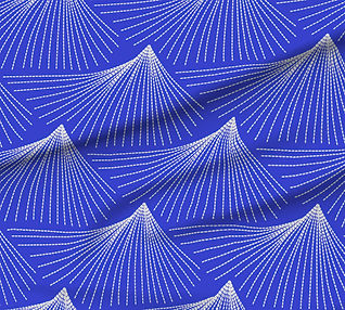 A slightly creased piece of fabric featuring abstract radiating lines forming mountaintop shapes in cobalt blue and warm white by lenes_linien.