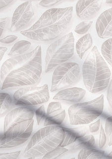 A slightly creased piece of fabric featuring a design of fallen, veined leaves hand-drawn by lenes_linien