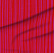 A slightly creased piece of fabric featuring irregular hand-painted vertical stripes in red and fuchsia by lenes_linien.