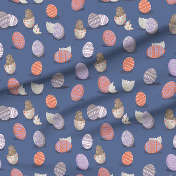 A slightly creased piece of fabric featuring the described easter bunny and egg shells design.
