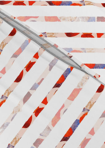 A slightly creased piece of fabric featuring vertical textured terrazzo stripes on whiteby lenes_linien.
