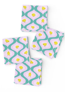 A slightly creased piece of fabric featuring yellow chicks in colorful retro ogee shapes by lenes_linien.