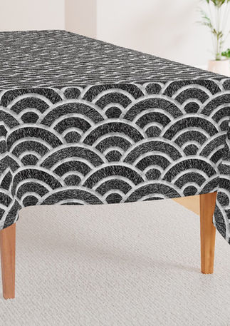 A slightly creased piece of fabric featuring textured black and white seigaiha waves and scallop arcs by lenes_linien.