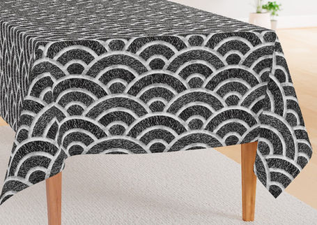 A slightly creased piece of fabric featuring textured black and white seigaiha waves and scallop arcs by lenes_linien.