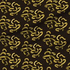 A slightly creased piece of fabric showing golden metal-like squiggle shapes on black ground.