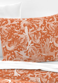 A slightly creased piece of fabric featuring crustaceans corals kelp and bubbles in orange and cream by lenes_linien.