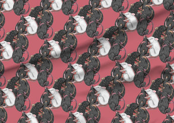 A slightly creased piece of fabric featuring rats tumbling about and cuddling each other.