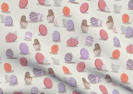 A slightly creased piece of fabric featuring the described easter bunny and egg shells design.