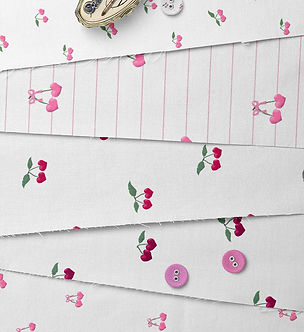 A Collection of fabrics showing different cherry designs by lenes_linien