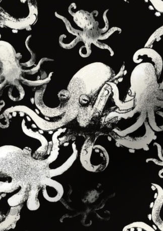 A slightly creased piece of fabric featuring the described octopus design.
