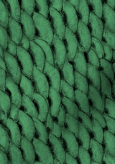 A slightly creased piece of fabric featuring the described scales design.