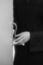 Thumbnail: Limber polished nickel luxury handles close up with a female hand
