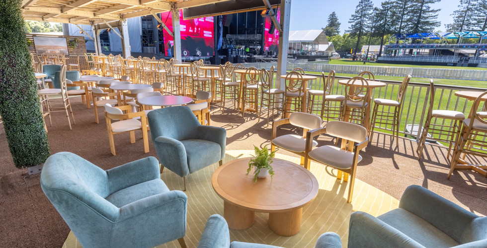 Rattan pendant lights and patterned lounge seating at Bottlerock 2025