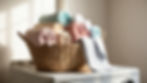 Basket of pastel towels on a washing machine in a sunlit room. Soft hues include pink, blue, and beige. Peaceful and tidy atmosphere.