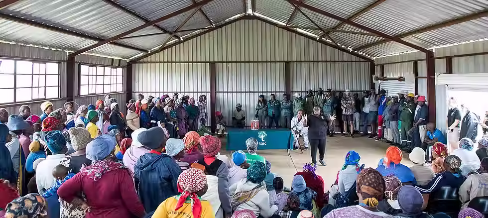Community gathering hosted by TASC in South Africa. Source: TASC .