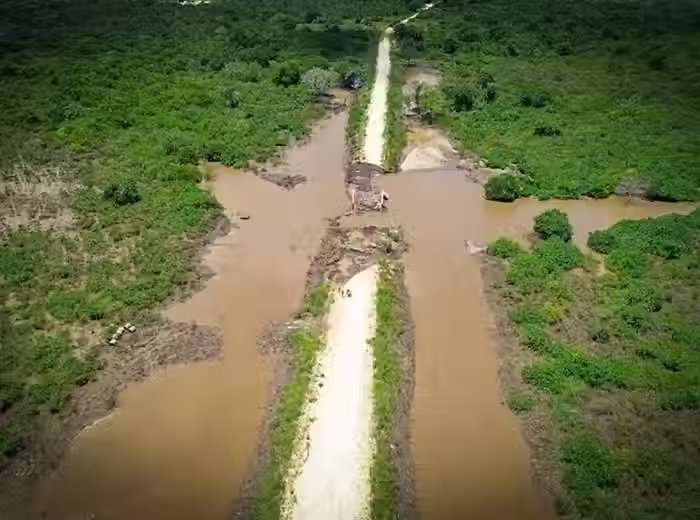 Flood damage to a road in Pwani Region, Tanzania. Photo by Alex Levis.