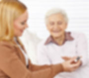 Pharmacist helping elderly woman