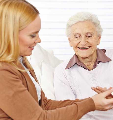 Pharmacist helping elderly woman