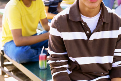 Coloured high school student smiling