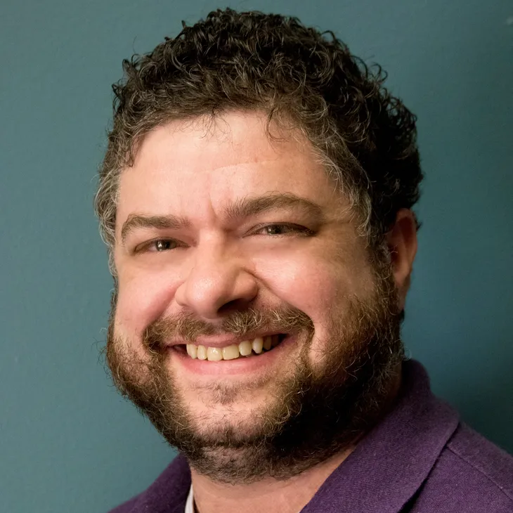 DR. JUSTIN LAMPERT