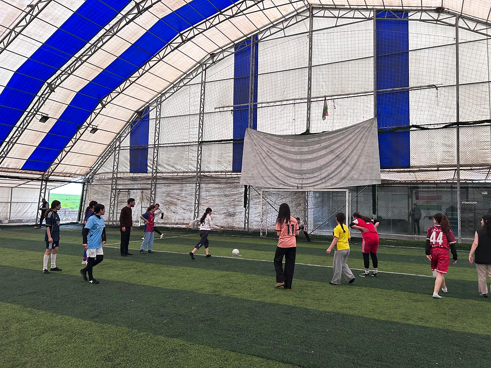 The girls football team at Bajed Kandala camp in March 2025, run by Imprint of Hope.