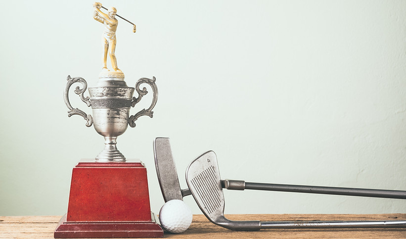 Golf Clubs, Ball and Trophy