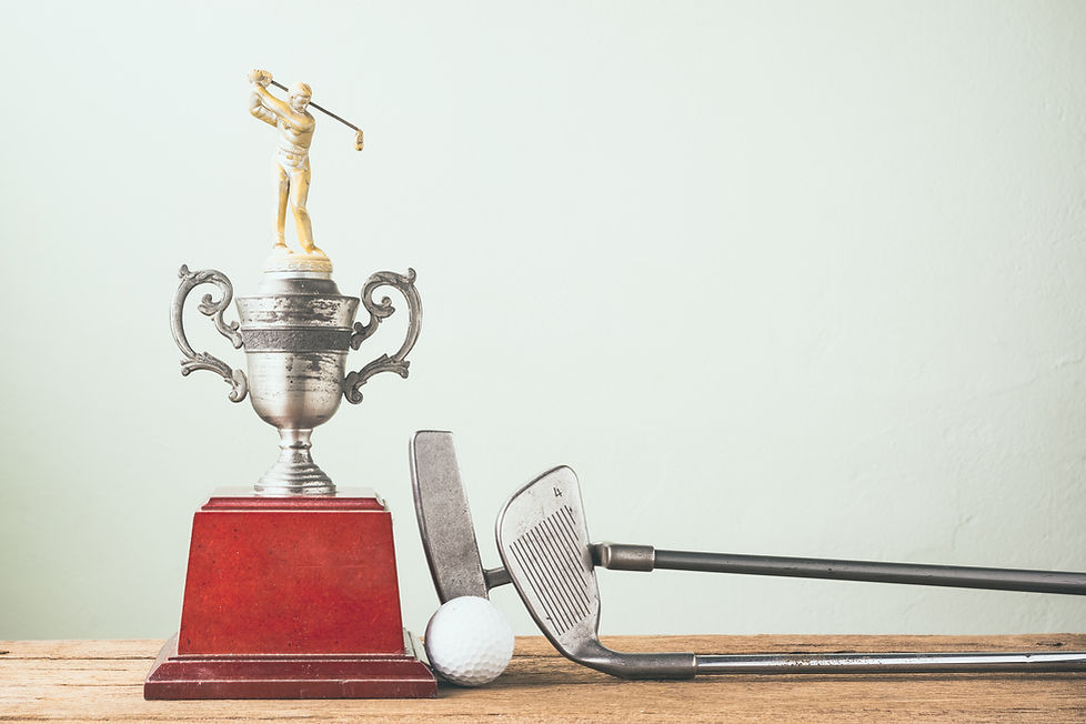 Golf Clubs, Ball and Trophy