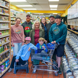 Shiela Ouellette and her family at New Morning Natural Foods in Kennebunk, Maine.