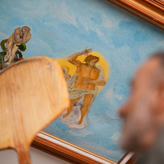 Original artwork hangs on the ceiling at Coletti's Pizza in Biddeford, Maine.