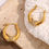 Thumbnail: ROSELLE CROSSING X CZ (18K GOLD) HOOP EARRINGS