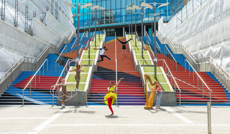 Performers on the steps in front of Wembley Stadium, London, on top of a vinylartwork applied to the steps