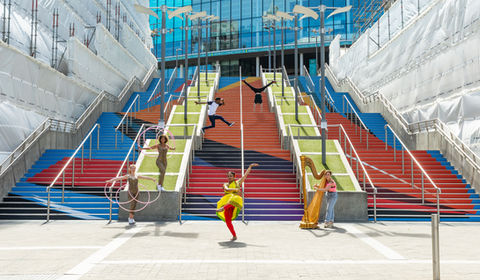 Performers on the steps in front of Wembley Stadium, London, on top of a vinylartwork applied to the steps