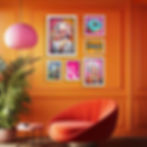 Candy Pop playful gallery wall with pink and candy-themed art prints displayed on a vibrant orange wall for a fun, colourful
