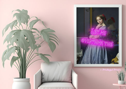 A calming pink living room with a witty ADHD neon-altered art print with the phrase "Let me overthink this" on it