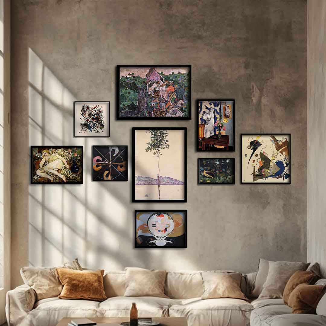 Beautifully Defiant gallery wall displayed on a concrete wall in a modern living room with a neutral sofa