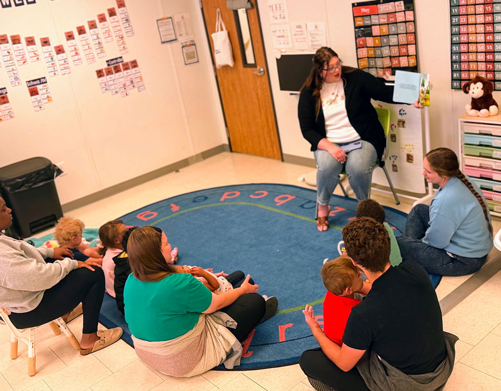 Children's author, Sabrina Fillers-Hurd reading to Anniston Academy students.