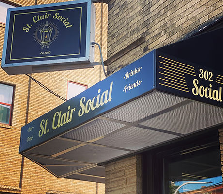 Image of the front door of St. Clair Social bar and restaurant in Pittsburgh, PA