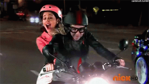 sam-and-cat-riding-a-motercycle.gif