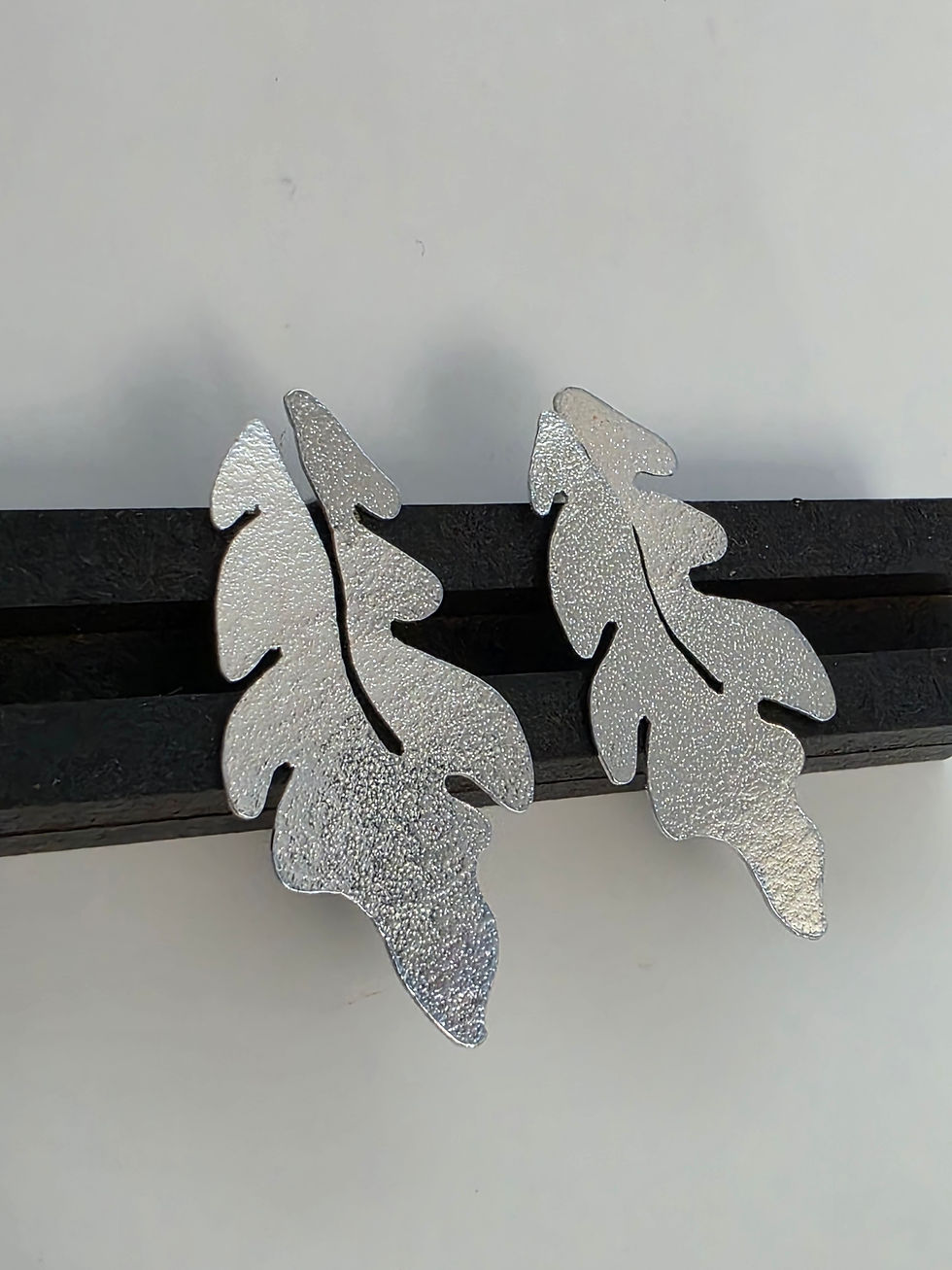 Thumbnail: Aretes con baño en plata