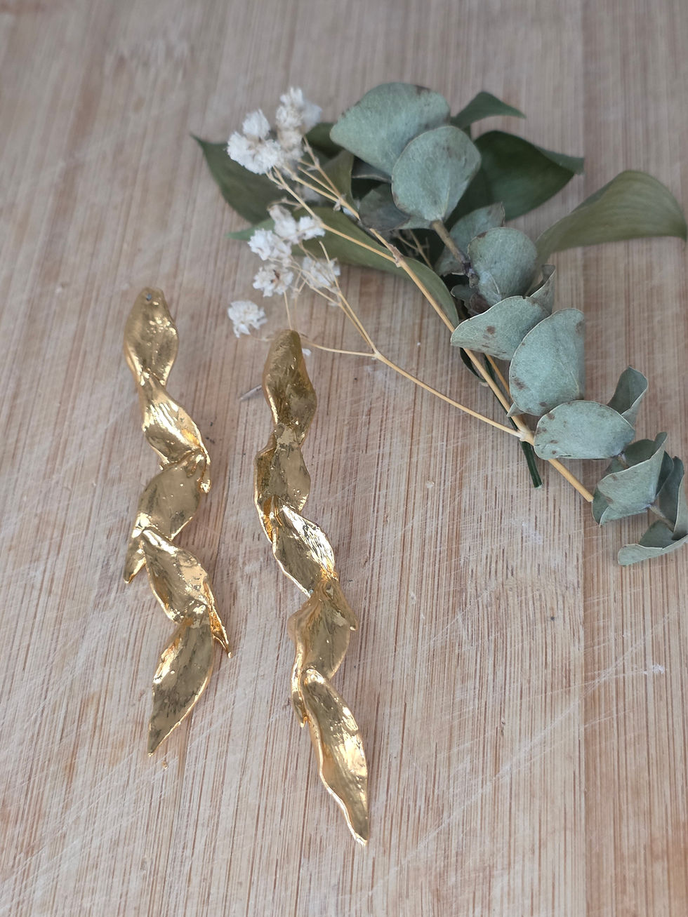Thumbnail: Aretes con baño en oro