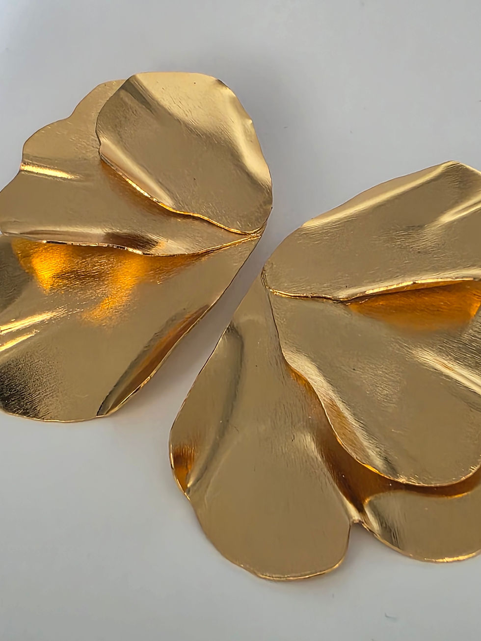 Thumbnail: Aretes en bronce con baño