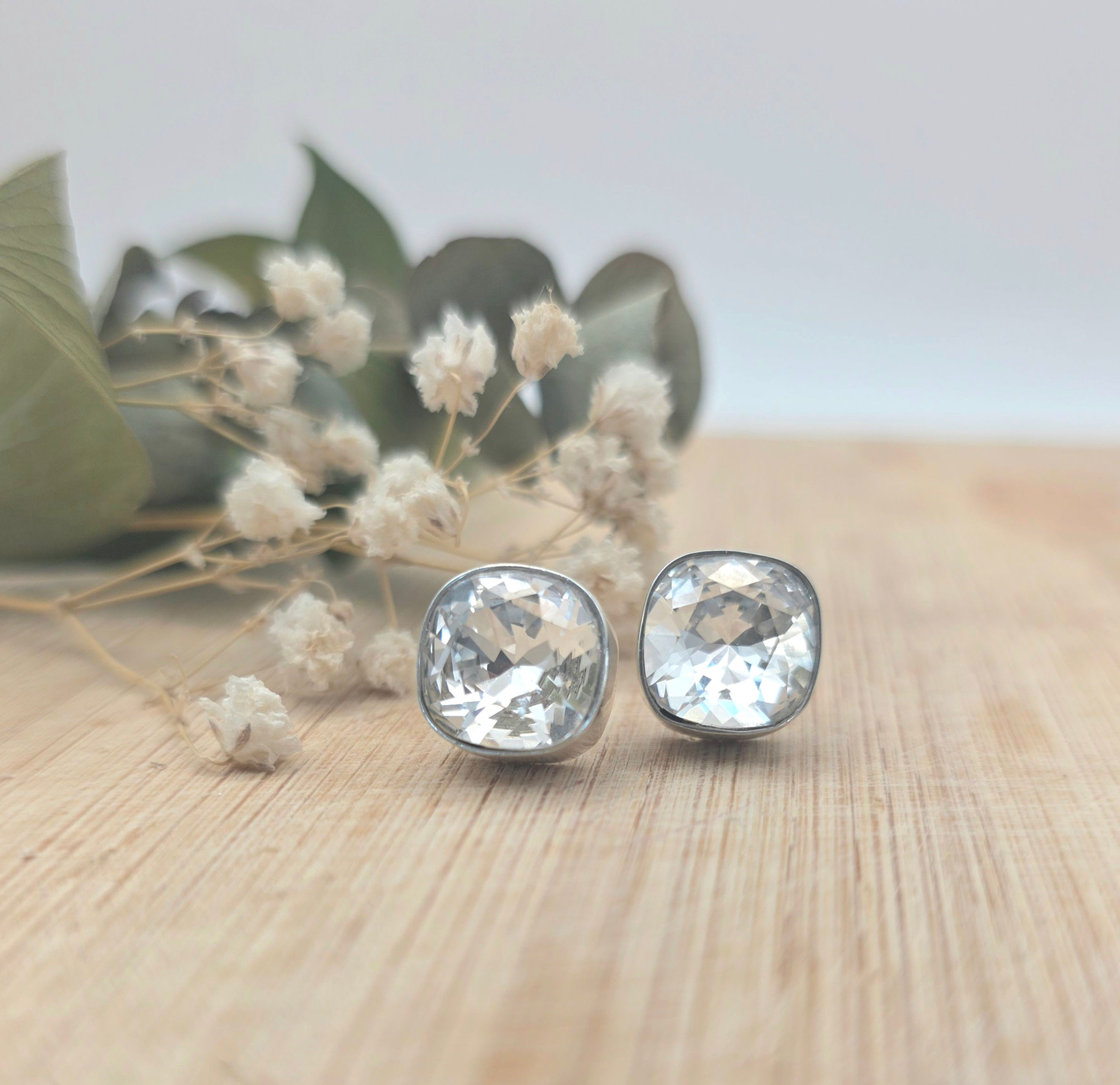 Aretes en plata creados con Cristales de Swarovski®️