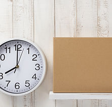 cardboard-box-on-wooden-shelf-PTLXZ6R.jp