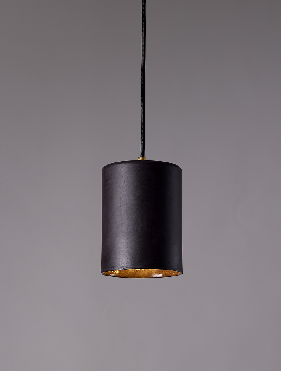 Moro black ceramic pendant light with cylindrical form