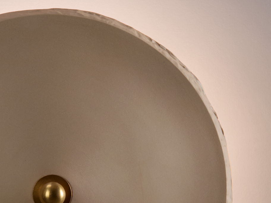 Amera mocha ceramic wall light with brass detail