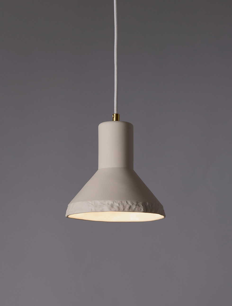 Kanayama white ceramic pendant light with raw stone texture