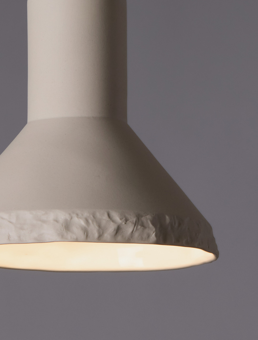 Kanayama white ceramic pendant light with raw stone texture