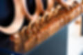 Copper tubes, copper corners and connections. Shallow depth of field.jpg