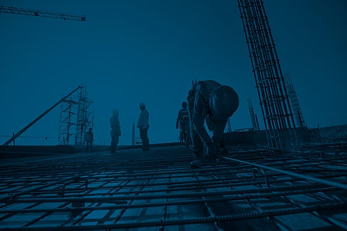 construction-workers-fabricating-steel-reinforcement-bar-at-the-construction-site.jpg