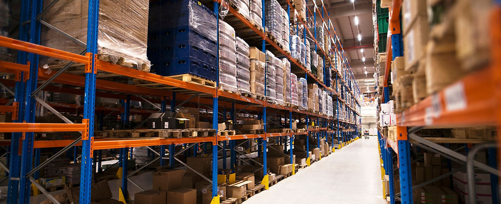 interior-large-distribution-warehouse-with-shelves-stacked-with-palettes-goods-ready-marke